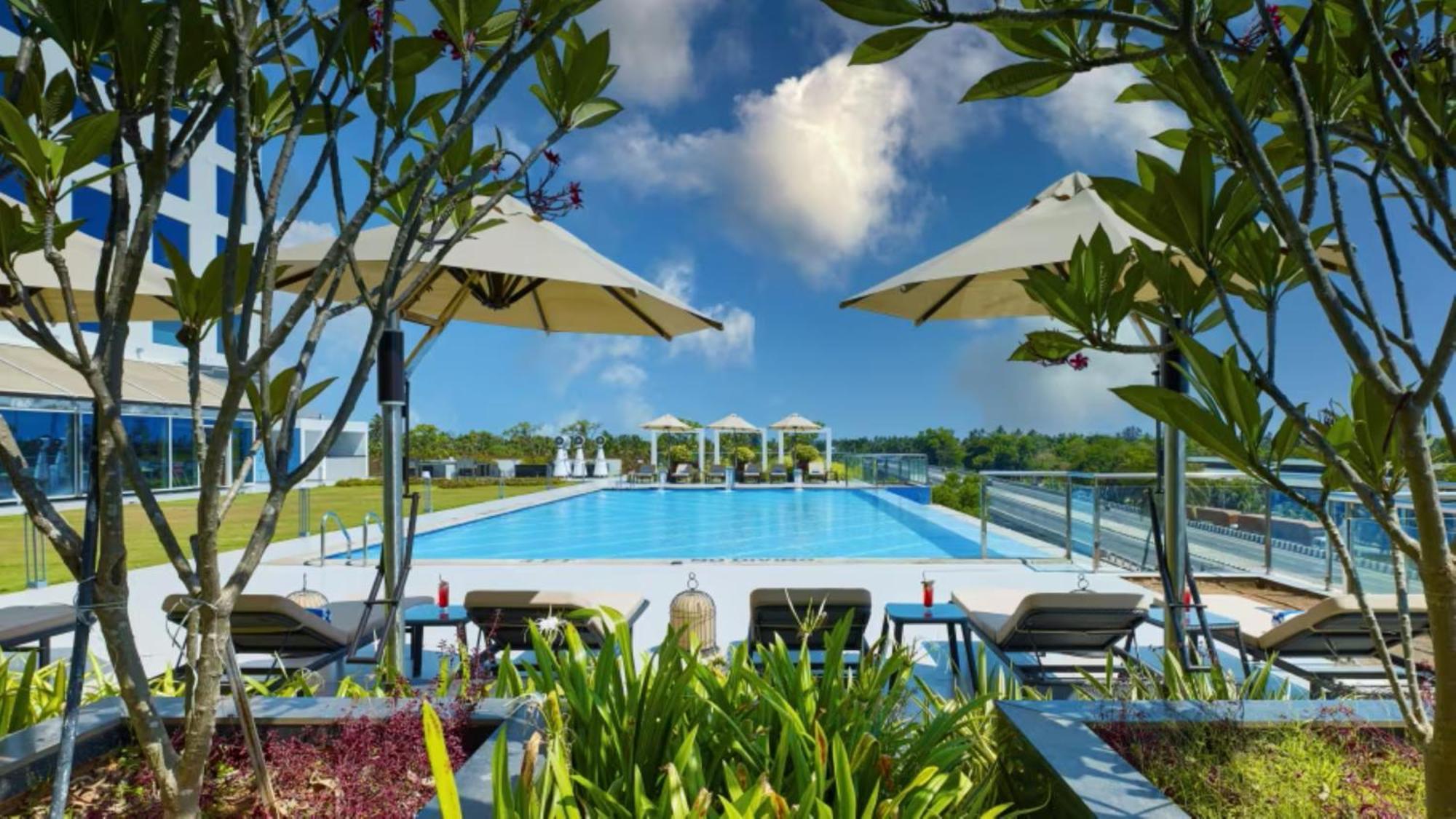 O By Tamara, Trivandrum Thiruvananthapuram Exterior foto The swimming pool at the resort